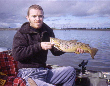 Gavan Moloney holds a solid Cairn Curran brown trout.