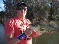 Kenty with his cod taken directly opposite the boat ramp
